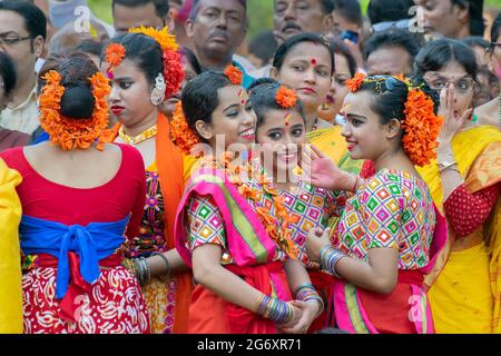 Kolkata, India - March 21st 2019 : Beautiful young girls in spring festive make up, smiling and enjoying at Holi festival, known as Dol (in Bengali) o Stock Photo