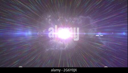 Bright white spot of light and rays glowing in the night sky Stock Photo