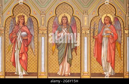 VIENNA, AUSTIRA - JUNI 17, 2021: The painting  fresco  Jesus meets the women of Jerusalem as part of Cross way stations in church Marienkirche Stock Photo