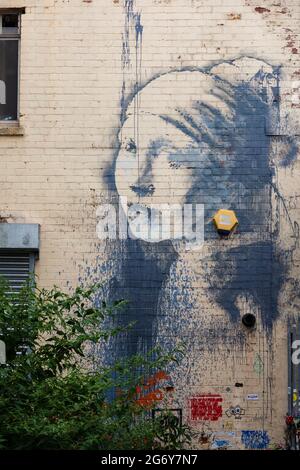 Banksy Graffiti The Girl with the Pierced Eardrum with blue