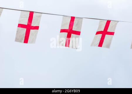 England bunting against on a cloudy sky in support of England in the Euro 2020 football tournament Stock Photo