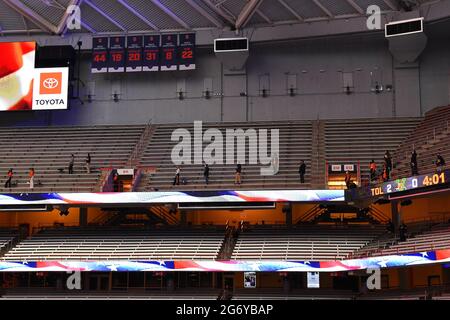 Syracuse, New York, USA. 06th Mar, 2021. Fans stand while socially distant during the National anthem prior to an NCAA mens lacrosse game between the Vermont Catamounts and the Syracuse Orange on Saturday, March 6, 2021 at the Carrier Dome in Syracuse, New York. Syracuse won 17-13. Rich Barnes/CSM/Alamy Live News Stock Photo