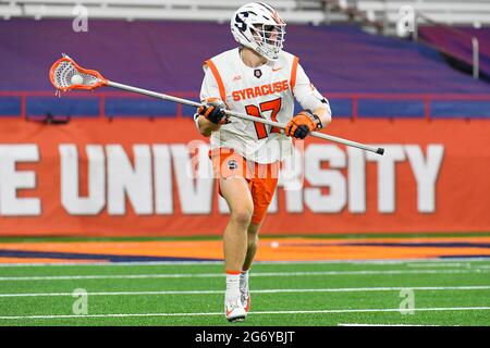 Syracuse, New York, USA. 06th Mar, 2021. Syracuse Orange defenseman Mitch Wykoff (17) runs with the ball against the Vermont Catamounts during the first half of an NCAA mens lacrosse game on Saturday, March 6, 2021 at the Carrier Dome in Syracuse, New York. Syracuse won 17-13. Rich Barnes/CSM/Alamy Live News Stock Photo