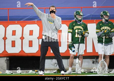 Syracuse, New York, USA. 06th Mar, 2021. Vermont Catamounts head coach Chris Feifs gestures from the sidelines against the Syracuse Orange during the second half of an NCAA mens lacrosse game on Saturday, March 6, 2021 at the Carrier Dome in Syracuse, New York. Syracuse won 17-13. Rich Barnes/CSM/Alamy Live News Stock Photo