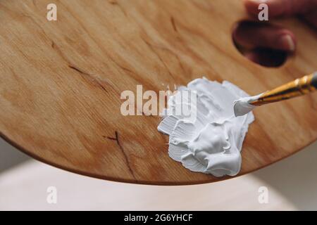 Close up of wooden palette with white paint Stock Photo