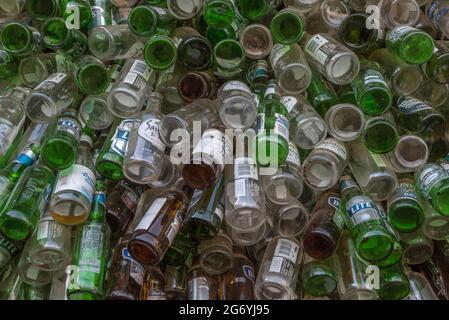 Background wall from empty bottles Stock Photo