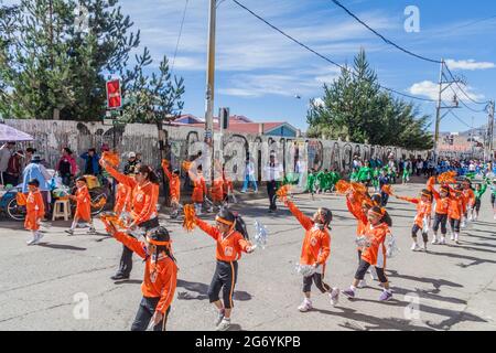 PUNO, PERU - MAY 14, 2015: Parade of children of Primary School Sagrado Corazon de Jesus 70003 in Puno, Peru Stock Photo