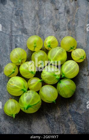 Green grapes on grey slate background Stock Photo
