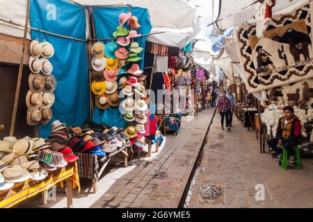 PISAC, PERU - MAY 22, 2015: Famous indigenous market in Pisac, Sacred Valley of Incas, Peru. Stock Photo