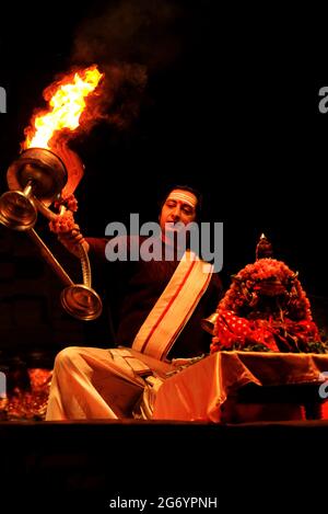 Varanasi, India 01 February 2021 Ganga aarti ceremony rituals performed by Hindu priests at Dashashwamedh Ghat in Varanasi Uttar Pradesh India Stock Photo