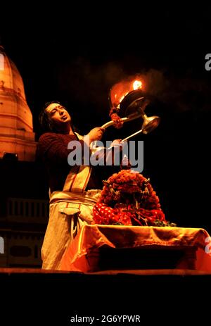 Varanasi, India 01 February 2021 Ganga aarti ceremony rituals performed by Hindu priests at Dashashwamedh Ghat in Varanasi Uttar Pradesh India Stock Photo