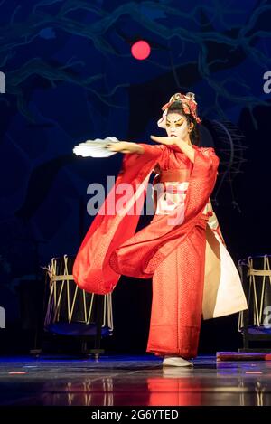 Woman dances with a fan. Traditional Japanese performance red fox dance ...