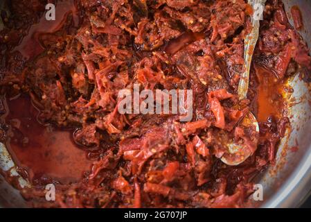 Fried hot spicy beef with Red chilli sauce, Sambal Daging Traditional Asian Food Stock Photo