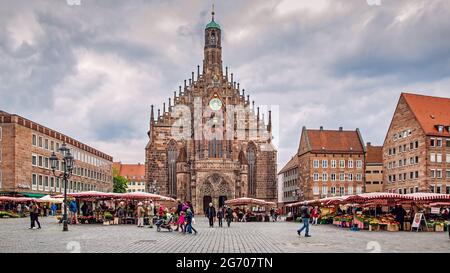 Nuremberg, Germany - May 17, 2016:  Frauenkirche church and Main Market Square in Nuermberg. Panoramic view, cityscape Stock Photo