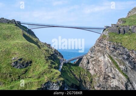 The new Tintagel Castle footbridge to Tintagel Castle Island, home of the legendary King Arthur and Camelot. From the South West Coast Path. Stock Photo