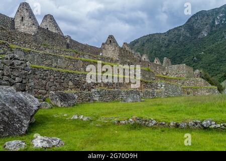 Former Agricultural Terraces And Buildings At Machu Picchu Ruins, Peru ...