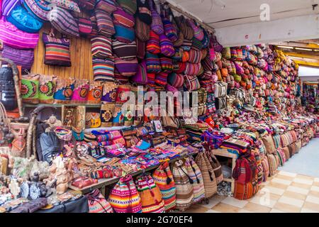 PISAC, PERU - MAY 22, 2015: Famous indigenous market in Pisac, Sacred Valley of Incas, Peru. Stock Photo