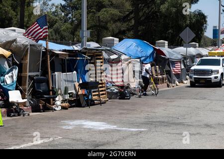 Los Angeles, CA USA - Julyl 3, 2021: Homeless tents outside the Veterans Administration in a stretch called Veterans Row Stock Photo