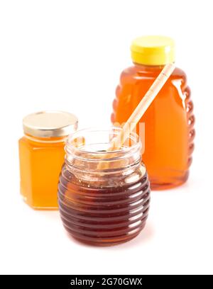 Jars of Raw Natural Honey Isolated on a White Background Stock Photo