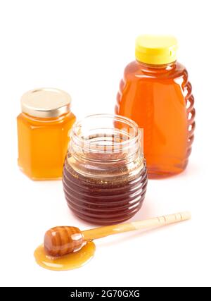 Jars of Raw Natural Honey Isolated on a White Background Stock Photo