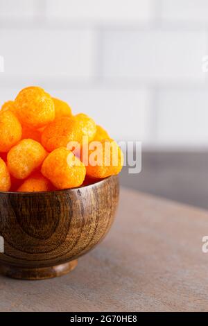 Cheese Puff Balls in Wooden Bowl on Light Background Stock Image - Image of  fried, cereal: 133510255