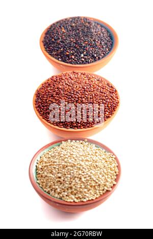 Three Bowls of Quinoa Varieties Isolated on a White Background Stock Photo