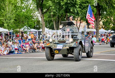 Prescott, Arizona, USA - July 3, 2021: Man driving a tank in the 4th of July parade Stock Photo
