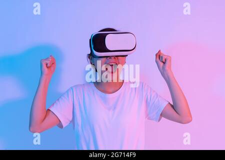 portrait of young asian girl wearing virtual reality glasses Stock Photo