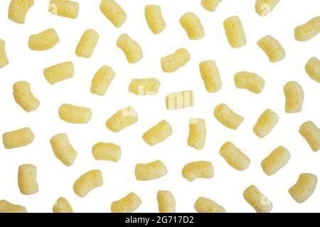 sweet corn sticks isolated on white background with clipping path, seamless pattern of yellow corn sticks, corn sticks with powdered sugar, top view Stock Photo