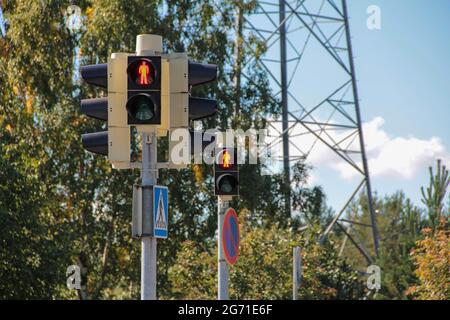 Trafic light on red for the pedestrials. Stock Photo