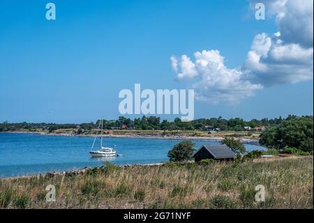 Characteristic landscape on the northwest coast of Swedish Baltic Sea island Öland. This tourist destination known as the island of sun and wind. Stock Photo