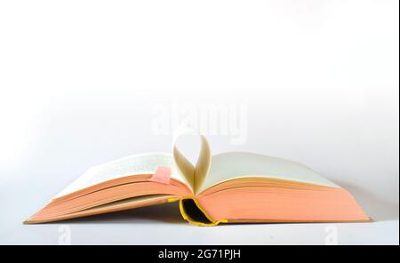 open book on white background. Reading,literature,education,library,home office, back to school concept,panoramic, large free copy space Stock Photo