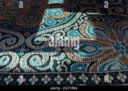 Background image of a blue eastern-inspired carpet Stock Photo