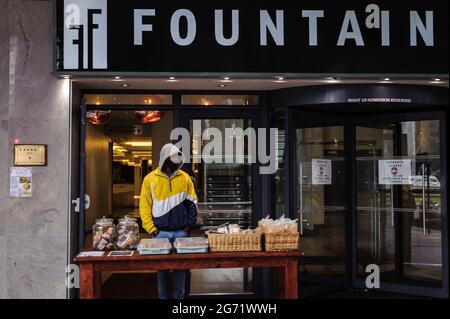 Cape Town's Fountains Hotel sold food and biscuits in the street to by-pass South Africa's strict pandemic lockdown protocols during the first wave Stock Photo