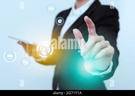 Woman In Uniform Side Standing Carrying Phone Tapping Futuristic Virtual Display Icons. Lady In Suit Holding Mobile Device Touching Innovative And Stock Photo