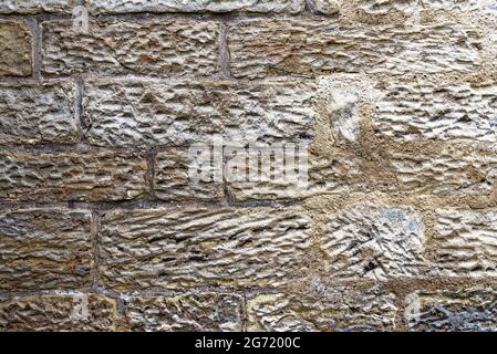 Texture of an old wall with different size stones - detail of an old wall Stock Photo