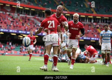 Cardiff, UK. 10th July, 2021. Tomos Williams of Wales (21) celebrates with Ross Moriarty after he scores a try in 2nd half. Rugby international friendly, Wales v Argentina, Summer series match at the Principality Stadium in Cardiff on Saturday 10th July 2021. pic by Andrew Orchard/Andrew Orchard sports photography Credit: Andrew Orchard sports photography/Alamy Live News Stock Photo