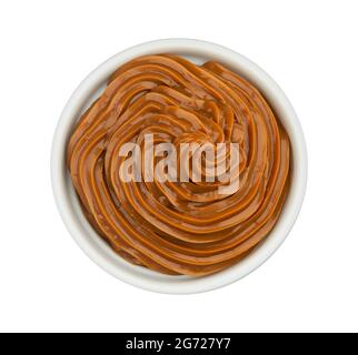Boiled condensed milk, melted caramel cream, top view Stock Photo
