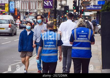 COVID-19 Marshals seen on patrol in Shaftesbury Avenue, central London, as coronavirus infections continue to rise again in England. (Photo by Vuk Valcic / SOPA Images/Sipa USA) Stock Photo
