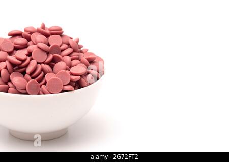 Authentic Ruby Chocolate Drops Isolated on a White Background Stock Photo