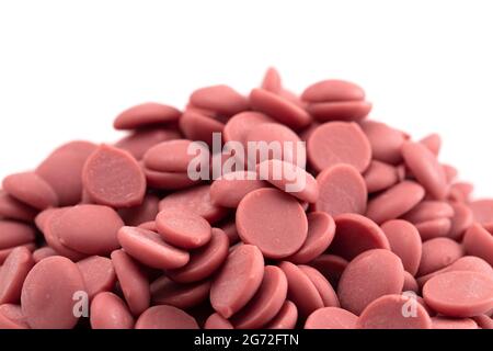Authentic Ruby Chocolate Drops Isolated on a White Background Stock Photo