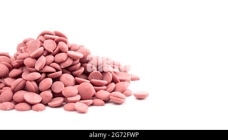 Authentic Ruby Chocolate Drops Isolated on a White Background Stock Photo