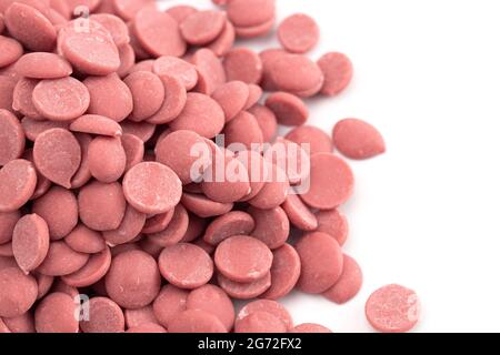 Authentic Ruby Chocolate Drops Isolated on a White Background Stock Photo