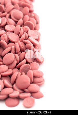 Authentic Ruby Chocolate Drops Isolated on a White Background Stock Photo