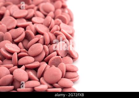 Authentic Ruby Chocolate Drops Isolated on a White Background Stock Photo