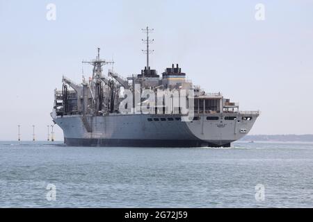The US Military Sealift Command Fast Combat Support ship USNS SUPPLY (T-AOE-6) departs from the Naval Base Stock Photo
