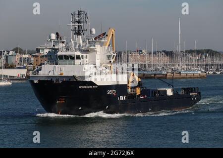 The offshore supply vessel SD NORTHERN RIVER sails from the Naval Base Stock Photo