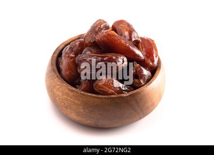 A Bowl of Pitted Dates Isolated on a White Background Stock Photo