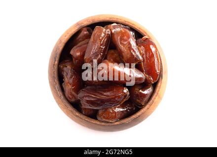 A Bowl of Pitted Dates Isolated on a White Background Stock Photo