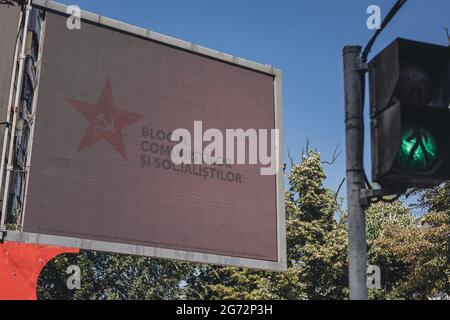 Chisinau, Moldova. 09th July, 2021. An advertising billboard of the coalition Bloc of socialists and communists integrated by PCRM (Communist Party of the Republic of Moldova) and PSRM (Socialist Party of the Republic of Moldova) in the streets.Election campaigns going on in the streets of Chisinau for Moldova's parliamentary elections. Credit: SOPA Images Limited/Alamy Live News Stock Photo